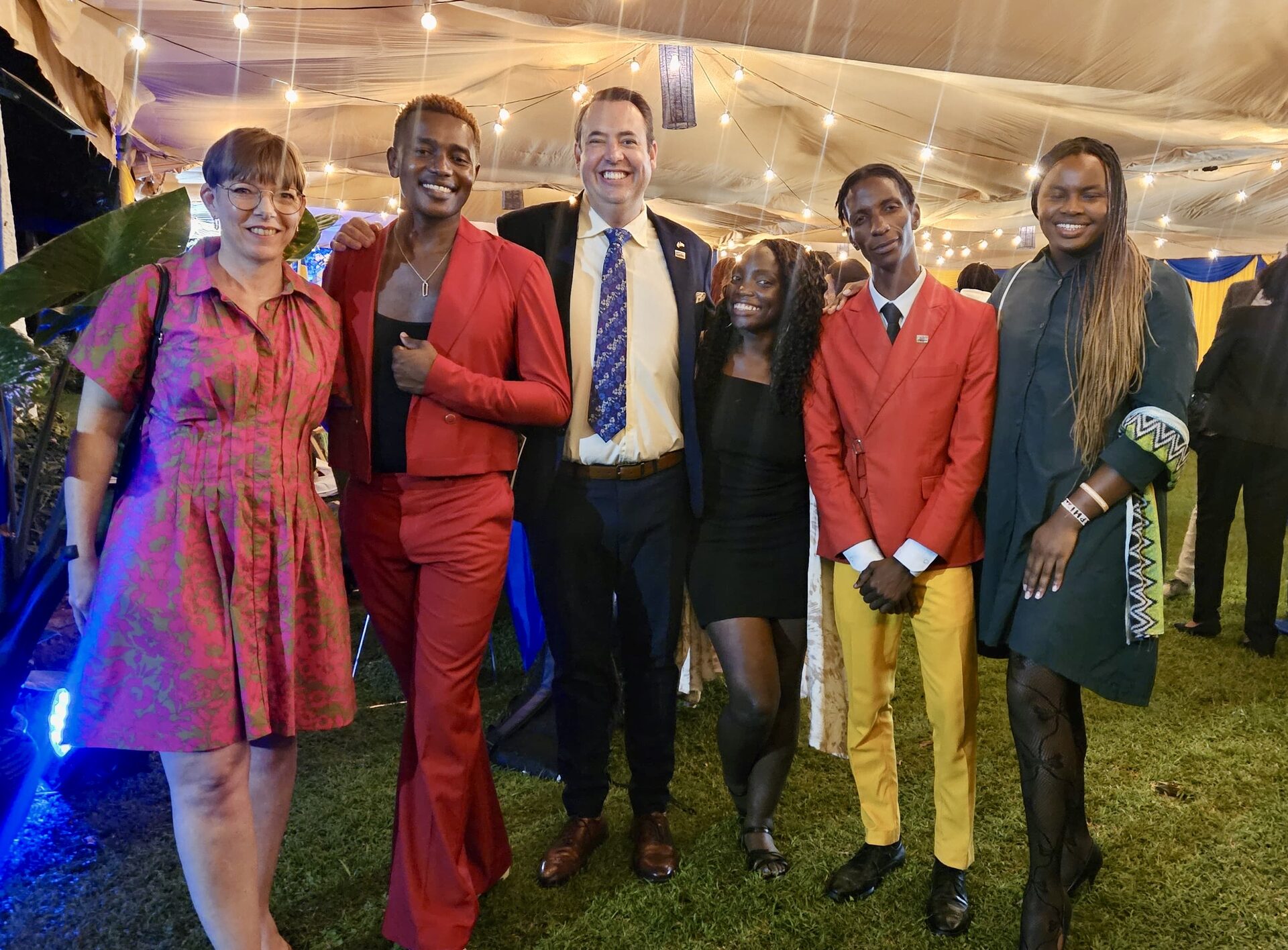 Guests gathered under string lights at a Croyah-curated evening event